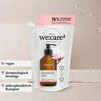 Nachhaltig nachfüllen mit idery: Der we:care² Nachfüllbeutel für Handseife (Magnolie & Sandelholz) spart 76 % Plastik im Vergleich zu herkömmlichen Flaschen. Das Bild zeigt den weißen Standbeutel mit Dosierkappe und die USPs: vegan, dermatologisch bestätigt und mikroplastikfreie Rezeptur. Ökologische Körperpflege.